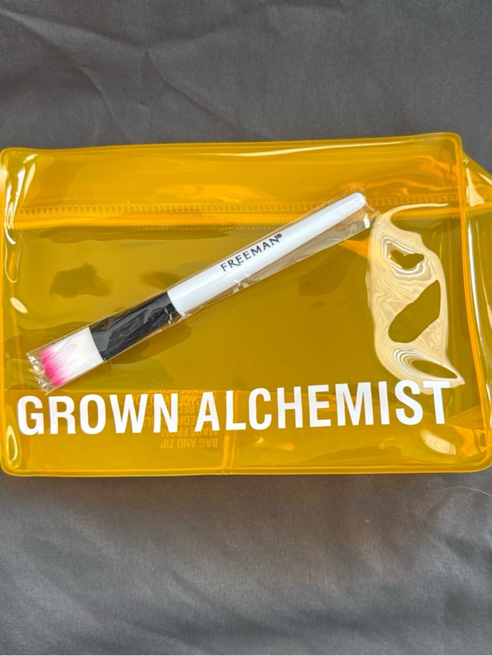 Grown Alchemist Orange Clear Bag with Free Makeup Brush